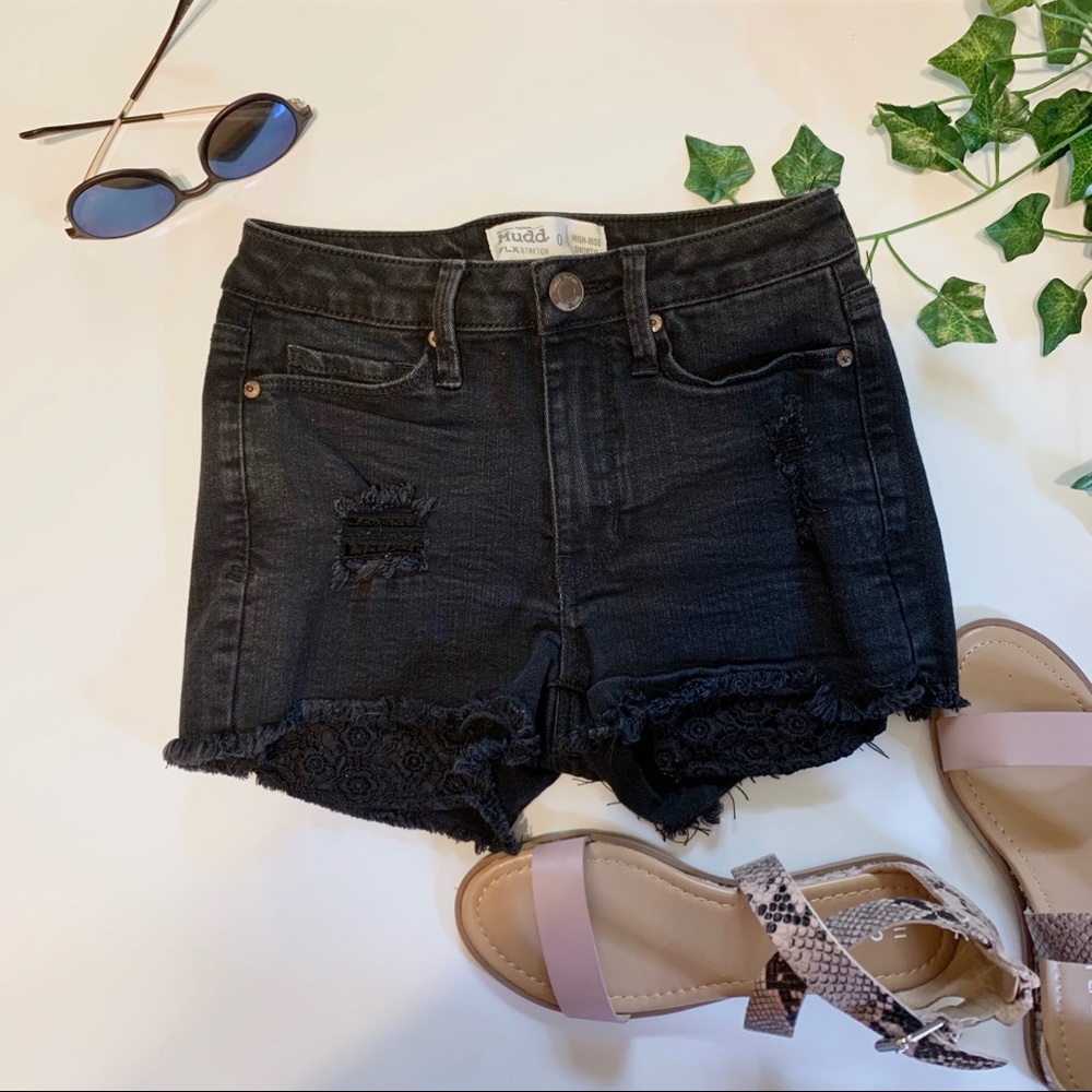 Black jean shorts with flower pocket design